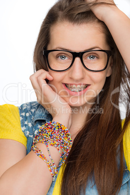 girl with braces wearing geek glasses isolated