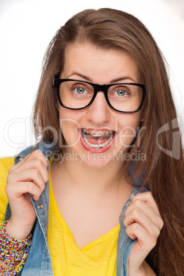 crazy girl with braces wearing geek glasses