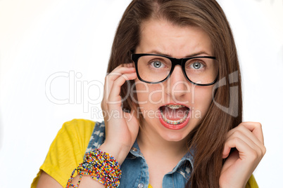 girl in braces wearing geek glasses isolated