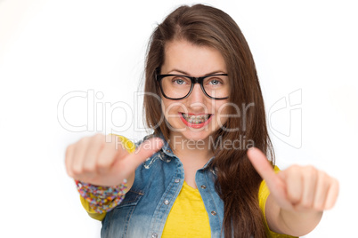 girl in braces showing thumbs up isolated