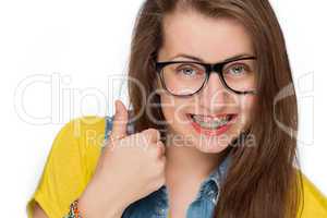 girl with braces show thumb up isolated