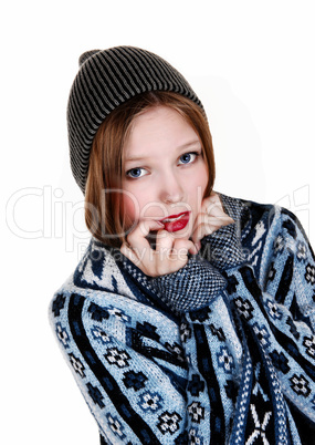 girl in sweater and hat.