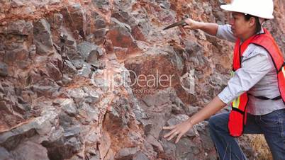 Female Mining Prospector Rock Chipping