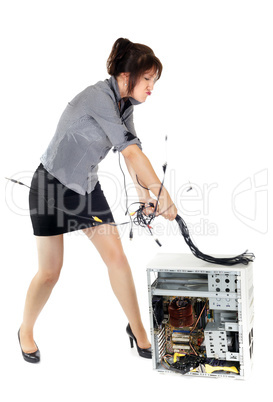 businesswoman beating computer