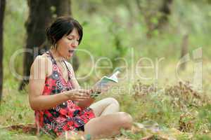 woman reading in nature