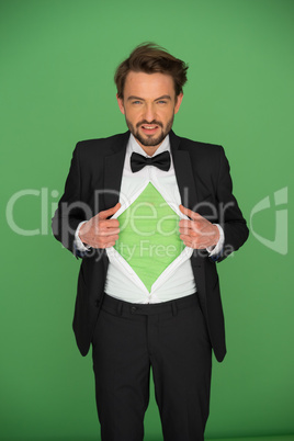 Man in a suit and bow tie revealing his chest