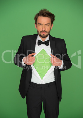 Man in a suit and bow tie revealing his chest