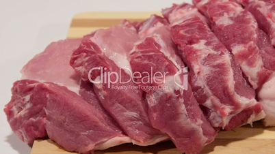 Dolly: Sliced fresh pork meat close-up