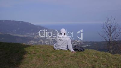 Female hiker resting on top of a mountain Ai-Petri