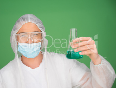 Laboratory technician holding a chemical solution