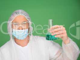 Laboratory technician holding a chemical solution