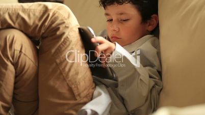 little boy relaxation with digital tablet
