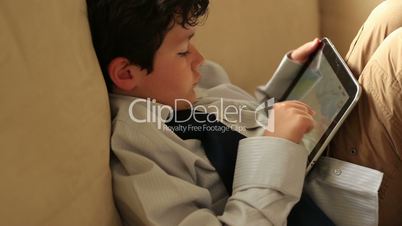 little boy with digital tablet