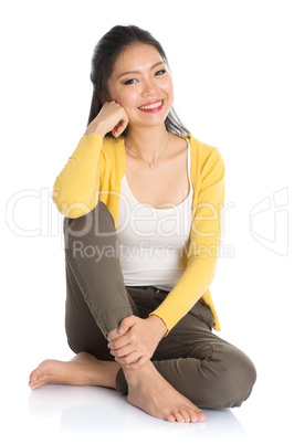 asian girl sitting on floor