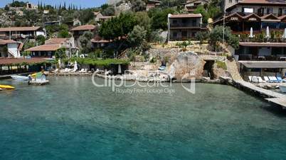 The turquoise water near beach and outdoor restaurants in Kekova, Antalya, Turkey