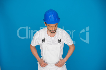 Workman in a blue hardhat