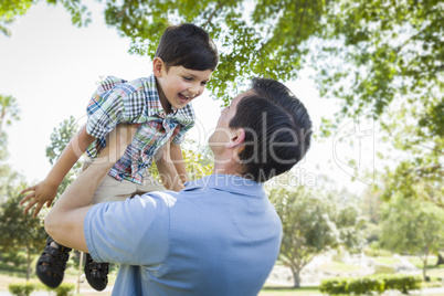 Father and Son Playing Together in the Park