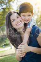 Attractive Mixed Race Mother and Son Hug in Park
