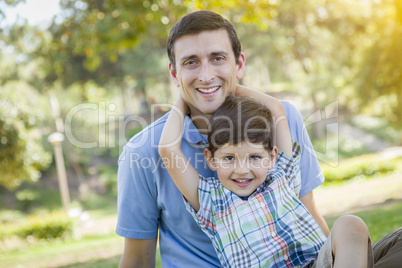 Handsome Mixed Race Father and Son Park Portrait