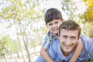 Father and Son Playing Together in the Park