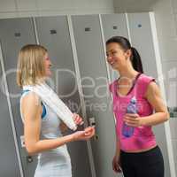 women talking in locker room