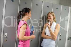 sport women talking in locker room