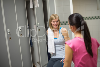 woman talking with friend in changing room