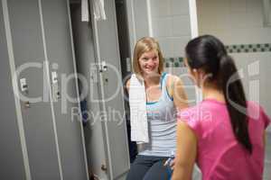 woman talking with friend in changing room