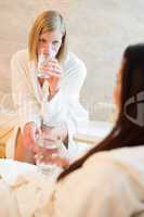 women drink water at beauty spa