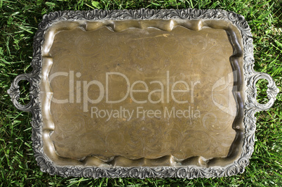 Old vintage metal tray platter with ornament