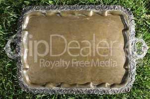 Old vintage metal tray platter with ornament