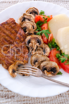 steak with green salad