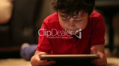 little cute kid using digital tablet 2