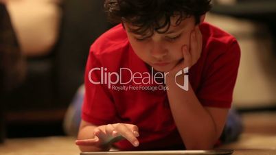 little cute kid using digital tablet 3