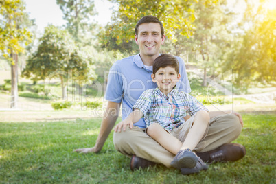 Handsome Mixed Race Father and Son Park Portrait