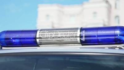 blue flashing emergency vehicle light beacon.