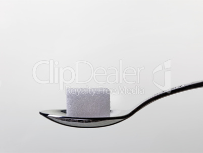 teaspoon with white sugar