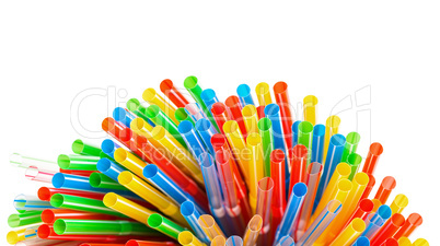 colored plastic drinking straws with copy-space