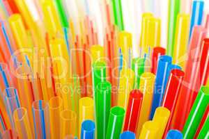 colored plastic drinking straws closeup