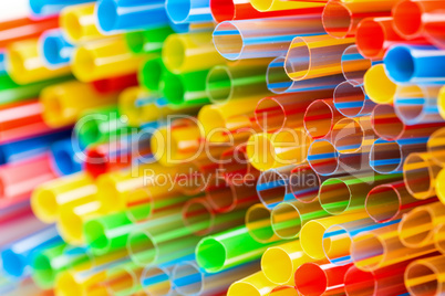 colored plastic drinking straws closeup