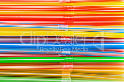 background of colored plastic drinking straws