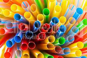 colored plastic drinking straws closeup