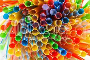 colored plastic drinking straws closeup