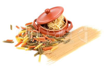 different types of pasta and a clay pot