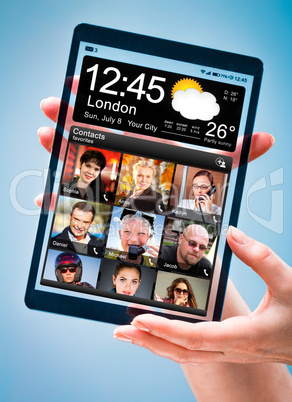 tablet with transparent screen in human hands.