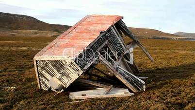collapsed hut