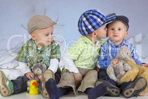 boy kissing his brother