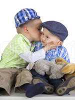 boy kissing his brother