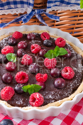 chocolate tartelette with forest fruits