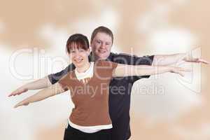 man and woman stretching her arms out with joy
